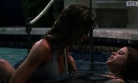 Lesbian scene with Denise Richards and Neve Campbell in the pool