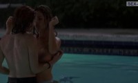 Lesbian scene with Denise Richards and Neve Campbell in the pool