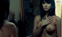 naked Clara Lago in front of the mirror